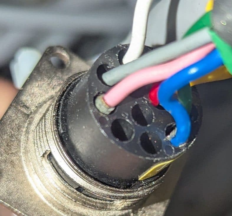 Corroded pin not seated correctly